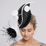 Model Sarah Czarnuch wearing Rebecca Share fascinator with flower made using her pods